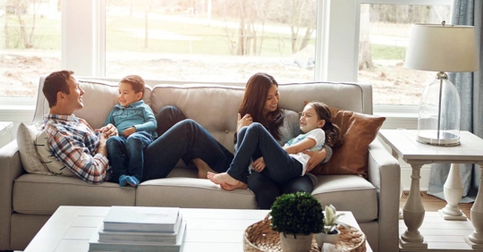 A family relaxing in a living room